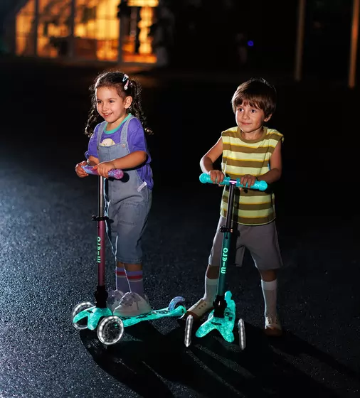 Самокат MICRO складной серии Mini Deluxe Foldable Orion Glow LED" &ndash; Розовый" - MMD373_9.jpg - № 9